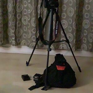 Canon EOS REBEL T3 Camera/Tripod/Camera Carrying Case/Rechargeable Battery